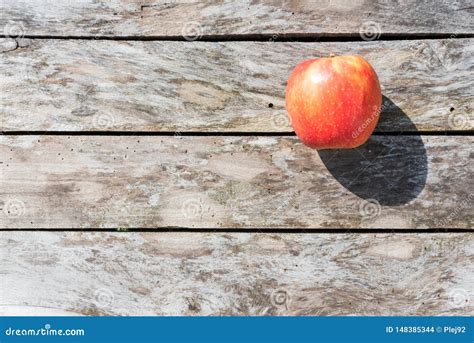 A Red Apple on a Wooden Table Stock Photo - Image of eating, natural ...