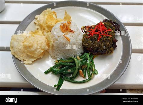 Nasi Ayam Cabe Hijau, Chicken Rice with green Chilli at Cafe, Bandung, Indonesia Stock Photo - Alamy