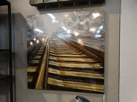 Metal Wall Art brings the train tracks to life in your room.