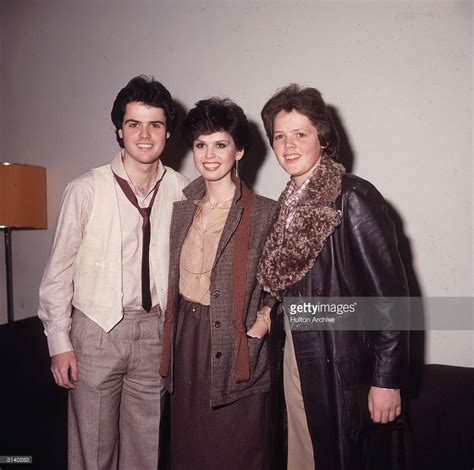 Three members of the Osmonds, known as the 'first family of pop'. From left to right, Donny ...