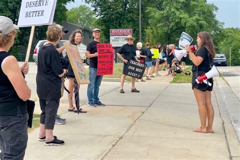 People rallied at two Menomonee Falls schools this week to protest the superintendent search process