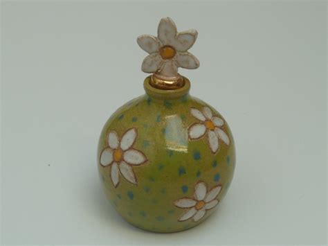 Daisy perfume bottle marked RC