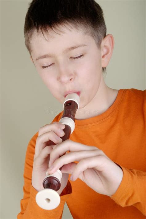 Boy Playing The Flute Picture. Image: 8298439