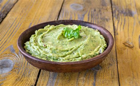 Bowl of guacamole 23491200 Stock Photo at Vecteezy