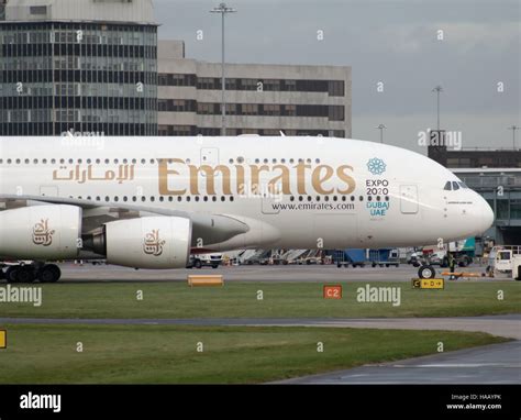 Emirates A380-861 double-decker wide-body passenger plane (A6-EDI) taxiing on Manchester ...