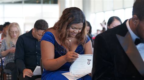 60 immigrants become Americans in naturalization ceremony