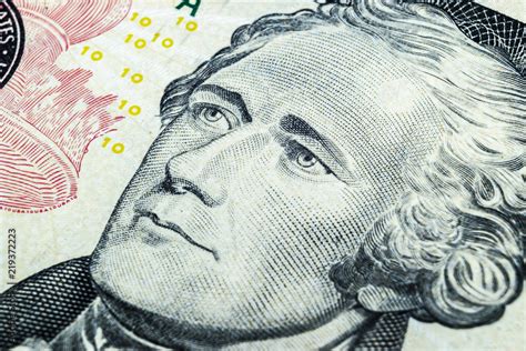 Close up view Portrait of Alexander Hamilton on the one ten dollar bill. Background of the money ...