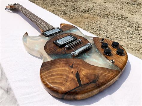 Guitar made of wood and epoxy resin | Guitar, Custom guitars, Electric ...