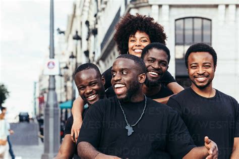 Happy black race friends hanging out in the city in a summer day. stock ...