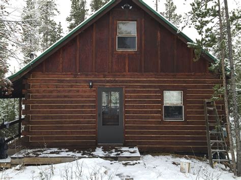 Log Home Finishing in Granby, CO Grand Lake. Log home cabin was walnut shell media blasted and ...