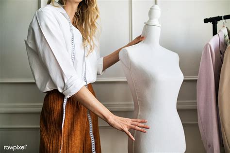 Designer holding a dummy mannequin | premium image by rawpixel.com / McKinsey Bold Outfit ...