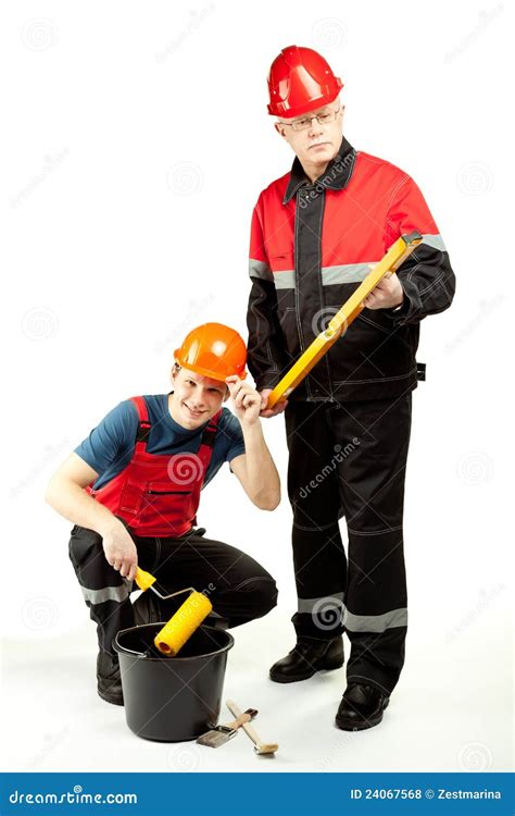 Construction Workers In Uniform With Tools Stock Photo - Image: 24067568