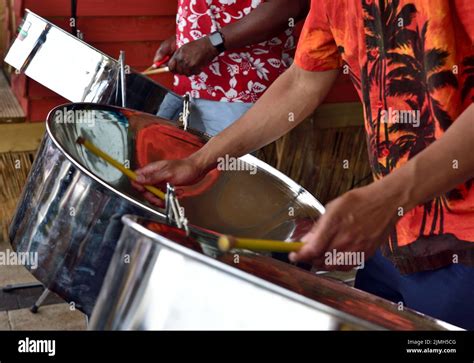 Musicians playing traditional Caribbean style steel drums Stock Photo - Alamy