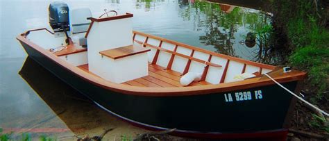 The skiff was often over 20 feet in length, four to five feet in beam, with considerable rake ...