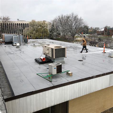 What’s the Average Lifespan of Commercial Flat Roofing? - Indiana Roofing Company