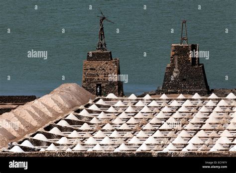 Sea salt production, salt pans, Salinas de Janubio, Lanzarote, Canary Islands, Spain Stock Photo ...