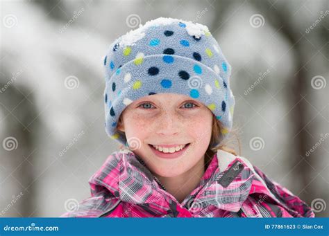 Girl wearing a winter hat stock image. Image of wintertime - 77861623