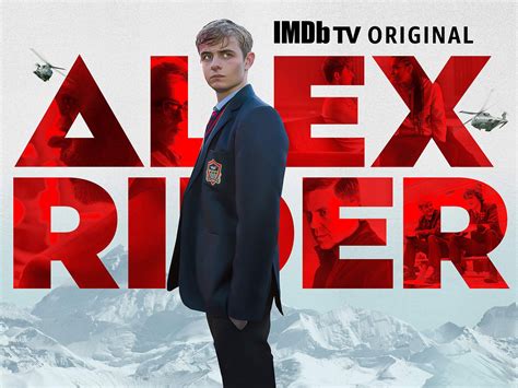 a man in a suit standing on top of a snow covered mountain next to the words alex rider