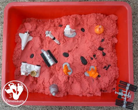 Space Theme: Mars Sensory Bin with Kinetic Sand – 3 Dinosaurs