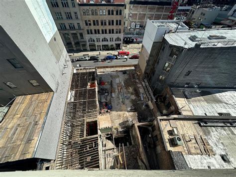 NYC worker dead and 3 hurt after rear wall of building under demolition ...