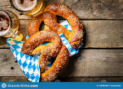 Oktoberfest Concept - Pretzels and Beer on Rustic Wood Background Stock Image - Image of ...