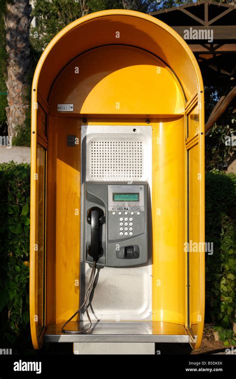 modern yellow public telephone booth protaras cyprus mediterranean ...