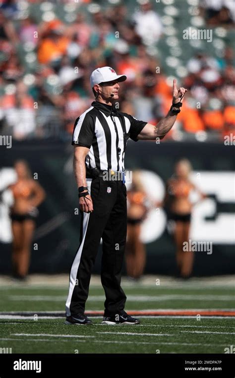 NFL referee Land Clark (130) on the field during an NFL football game, Sunday, Aug. 29, 2021, in ...