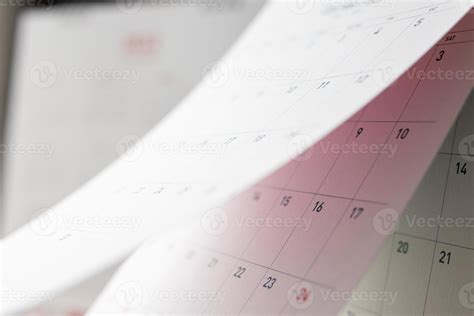 Abstract blur calendar page flipping sheet close up background business schedule planning ...