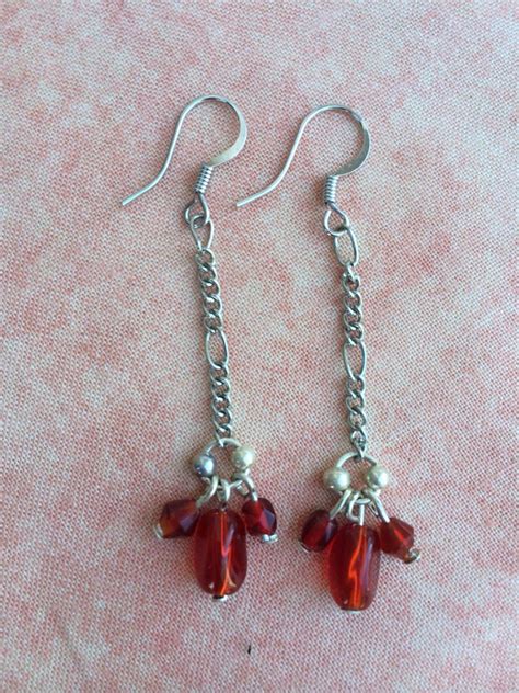 Earrings - Red and silver | Amazing jewelry, Drop earrings, Jewelry