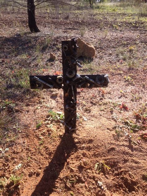 A cross I made with nuts bolts screws shearing combs and then wrapped wire around | Old farm ...