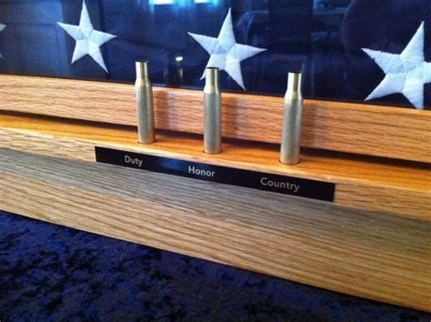 Flag Display Case with shell casings | Flag display case, Memorial flag display, Flag display