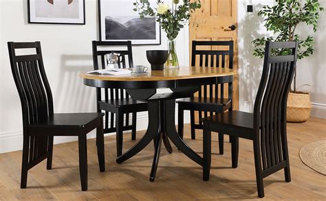 Hudson Round Painted Black and Oak Extending Dining Table with 6 Java ...