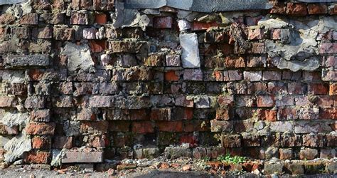 The texture of very old and cracked brick wall 13250140 Stock Photo at Vecteezy