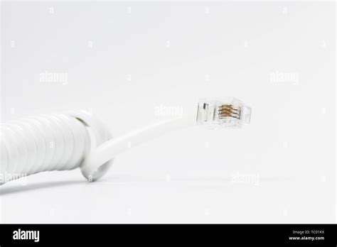 spiral cable on white Stock Photo - Alamy