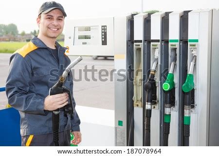 Gas Station Attendant Stock Photos, Images, & Pictures | Shutterstock