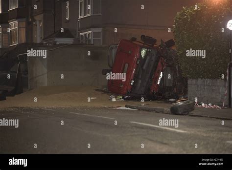 The scene of a tipped over lorry after the tipper truck collided with ...