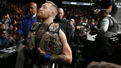 Conor McGregor is still carrying around two UFC title belts - Bloody Elbow