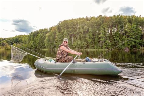 Premium Photo | Fisherman in a boat