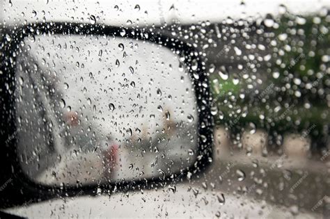 Premium Photo | View of a car side mirror from inside the car with ...