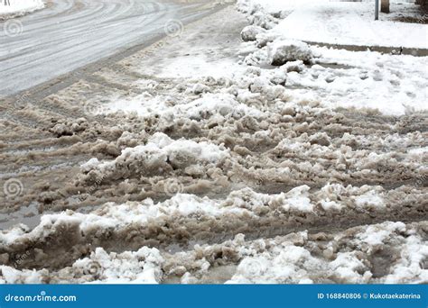 Slush, Snow Mixed with Mud on the Road. the Road is Not Cleared of Snow ...