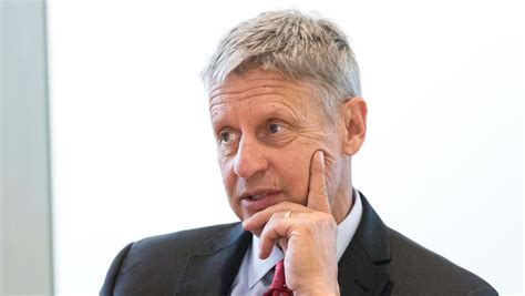 Download Gary Johnson In A Suit With White Backdrop Wallpaper | Wallpapers.com