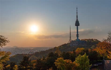 Premium Photo | View of seoul city skyline and seoul tower at sunset ...