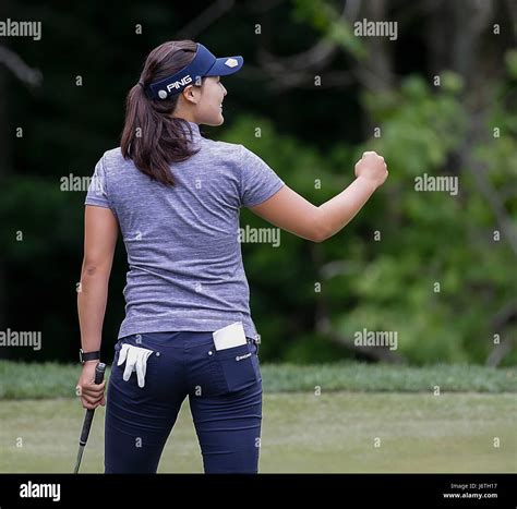 Williamsburg, Virginia, USA. 21st May, 2017. In Gee Chun pumps her fist after sinking a putt for ...