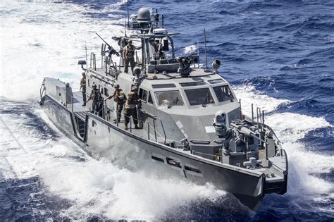 Mark VI patrol boat MESS2 unrep USS ASHLAND (LSD 48) Philippine Sea ...