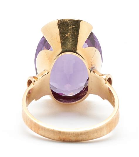 Lot 553: 18K Purple Sapphire Ring | Case Auctions