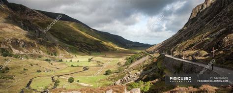 Landscape road through mountain pass — clouds, river - Stock Photo ...