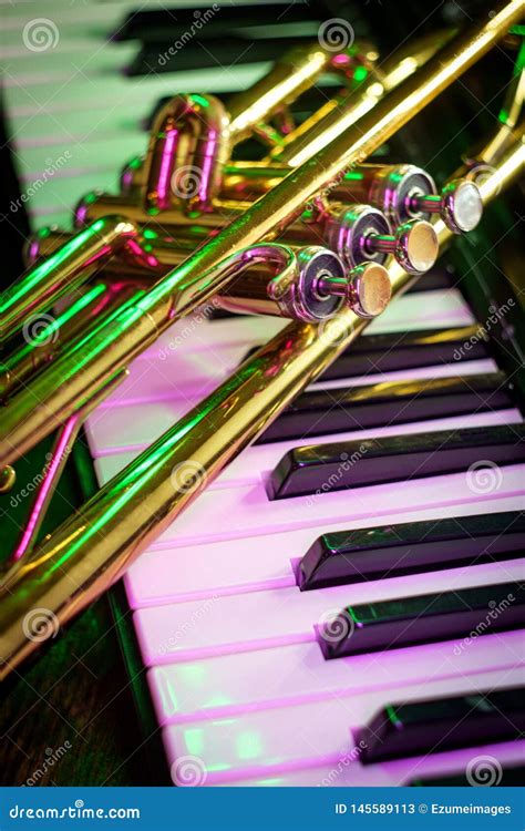 Old Trumpet Piano Keyboard stock image. Image of jazz - 145589113