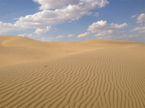 Free Images : landscape, nature, sand, light, sun, desert, dune, blue sky, clouds, background ...