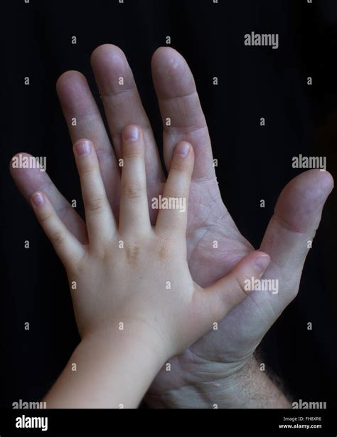 Old hands with younf hands hi-res stock photography and images - Alamy