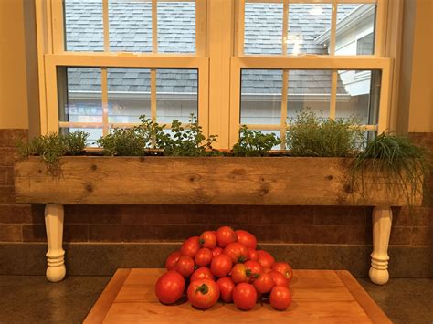 Kitchen window herb garden. Thanks to a simple idea and a loving and patient husband. Kitchen ...